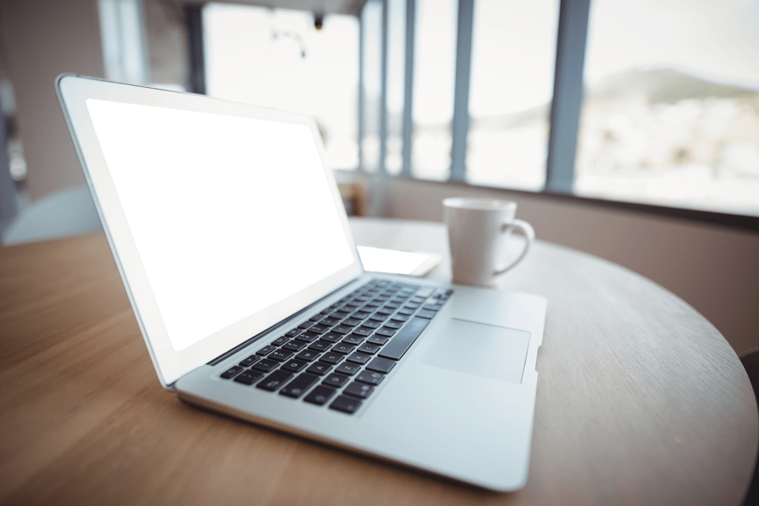 Open Laptop with Transparent Screen in Office Environment