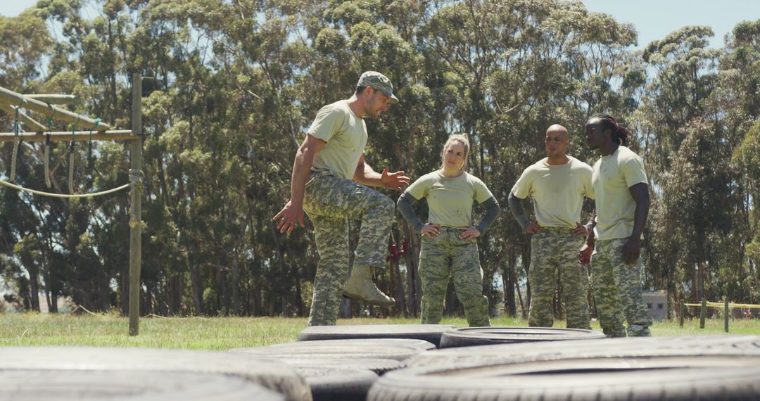 Training Relays at Military Obstacle Course With Diverse Recruits
