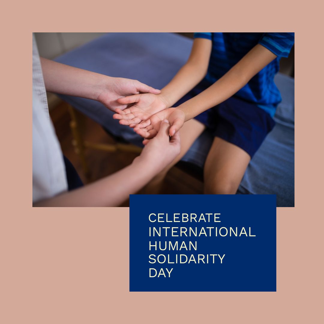 Hands Holding in Support for Human Solidarity Day