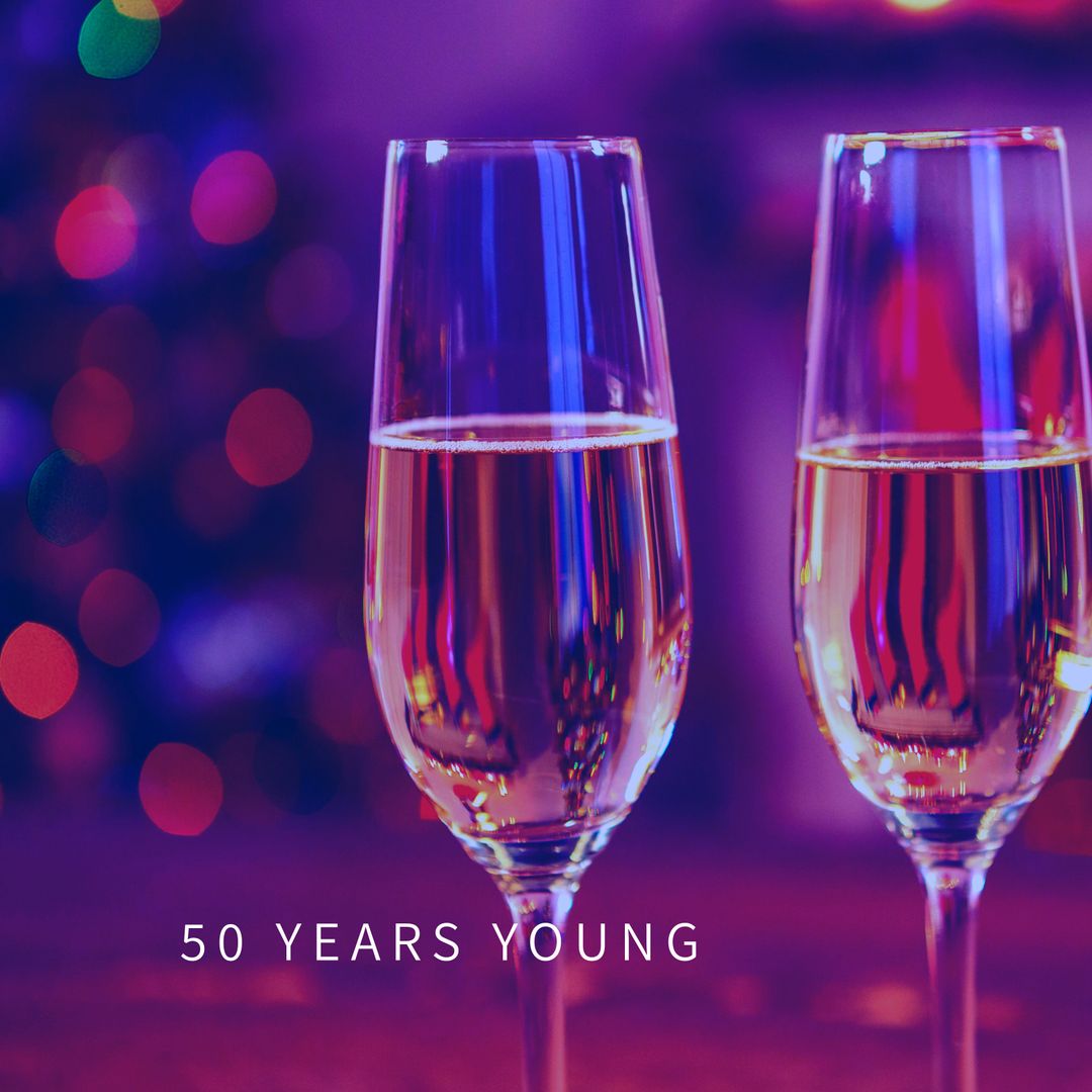 Elegant Toast for Milestone Celebration with Champagne Flutes