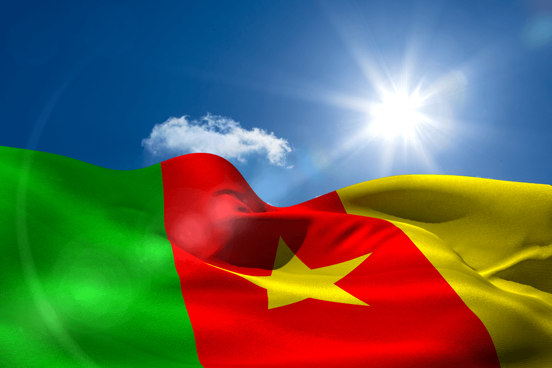 Cameroon Flag Waving Under Bright Sun on Transparent Sky Background