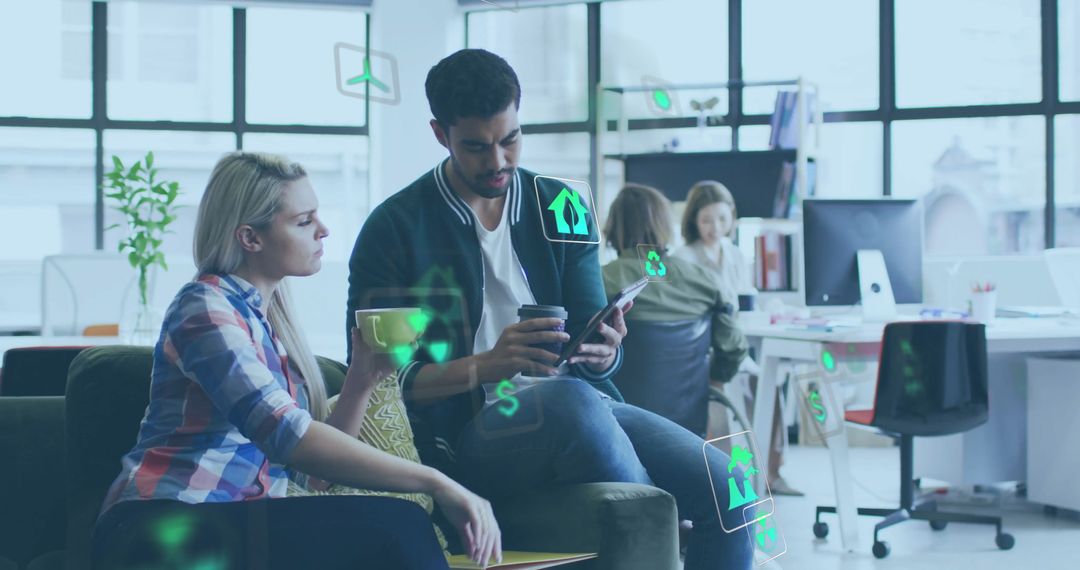 Colleagues Using Tablet with Augment Reality in Modern Eco-Friendly Office