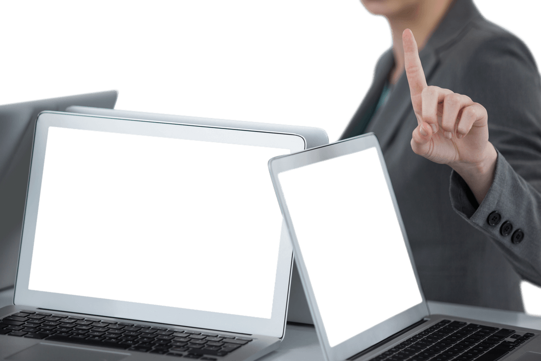 Businesswoman Displaying Gesture Near Transparent Laptops