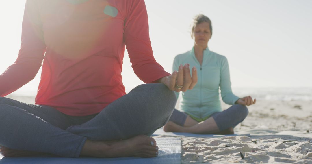 People Practicing Yoga on Beach at Sunrise - Free Images, Stock Photos and Pictures on Pikwizard.com