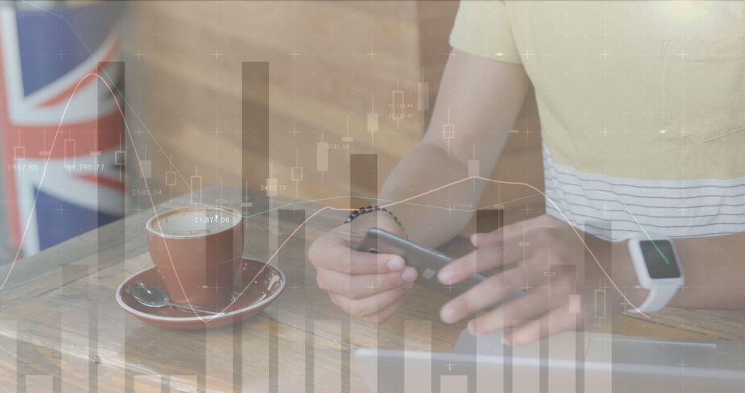 Man Analyzing Stock Market Data on Smartphone and Laptop in Coffee Shop - Free Images, Stock Photos and Pictures on Pikwizard.com