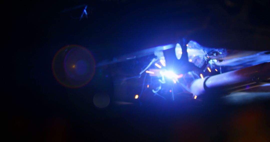 Close-up of Welder at Work with Bright Blue Sparks - Free Images, Stock Photos and Pictures on Pikwizard.com