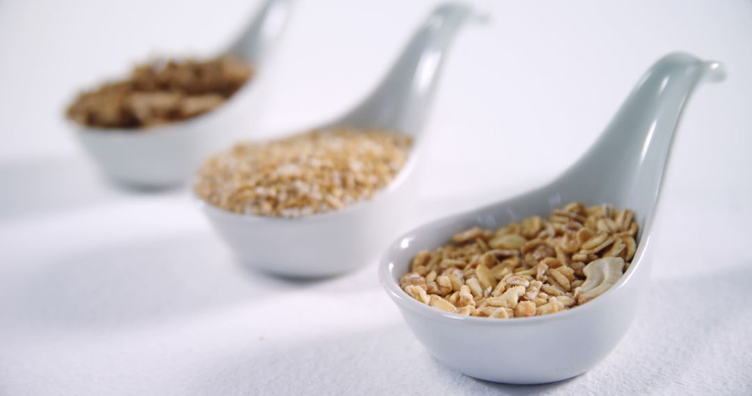 Variety of Grains in Spoons Highlighting Nutritious Choices - Free Images, Stock Photos and Pictures on Pikwizard.com