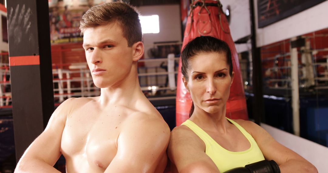 Confident Boxers Posing in Gym with Determined Expressions - Free Images, Stock Photos and Pictures on Pikwizard.com