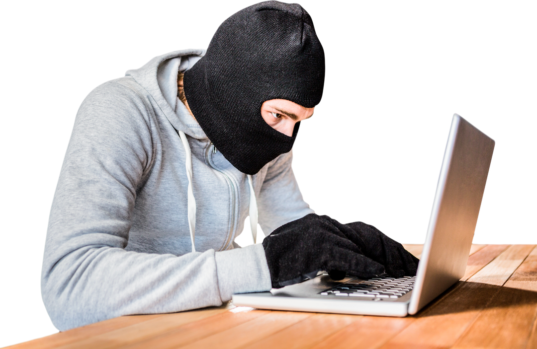 Focused Thief in Hood Typing on Laptop with Transparent Background - Download Free Stock Images Pikwizard.com