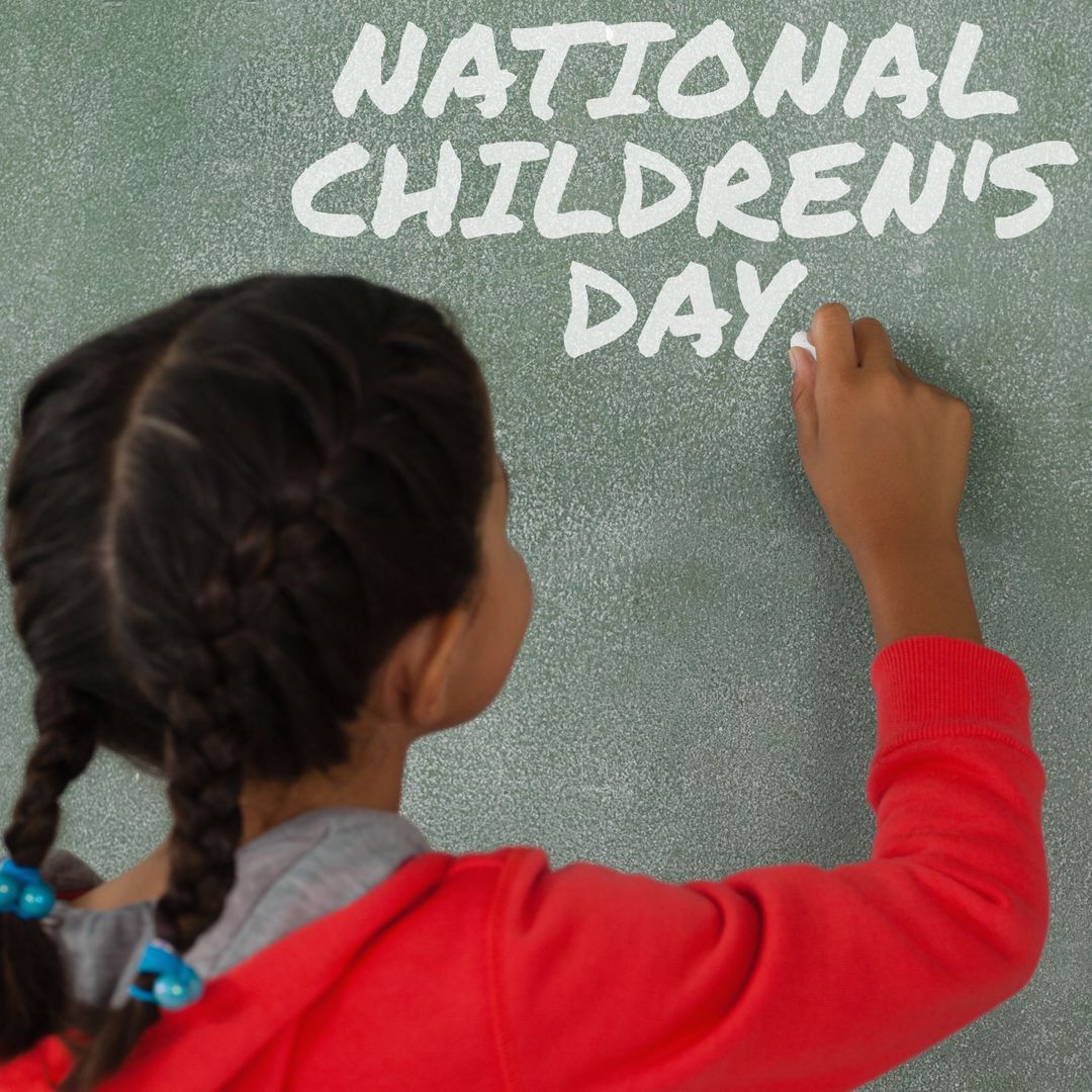 Young Girl Writing on Chalkboard for National Children's Day