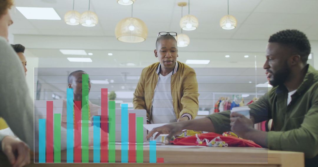 Diverse Team Collaborating in Office with Interactive Data Visualization