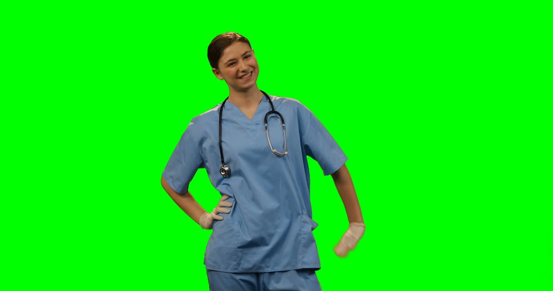 Smiling Female Nurse in Surgical Scrubs on Green Screen - Free Images, Stock Photos and Pictures on Pikwizard.com