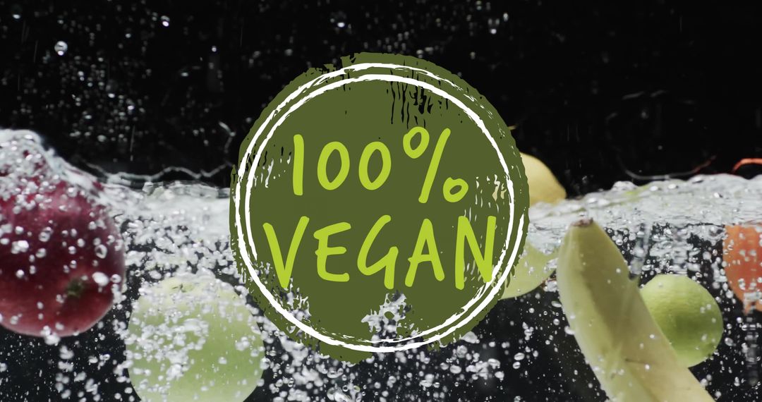 100 Percent Vegan Concept with Fresh Fruits in Water Splash