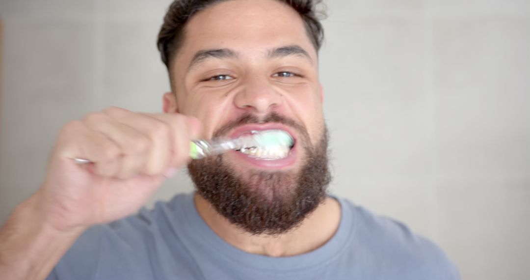 Man with Beard Brushing Teeth for Daily Oral Care Routine