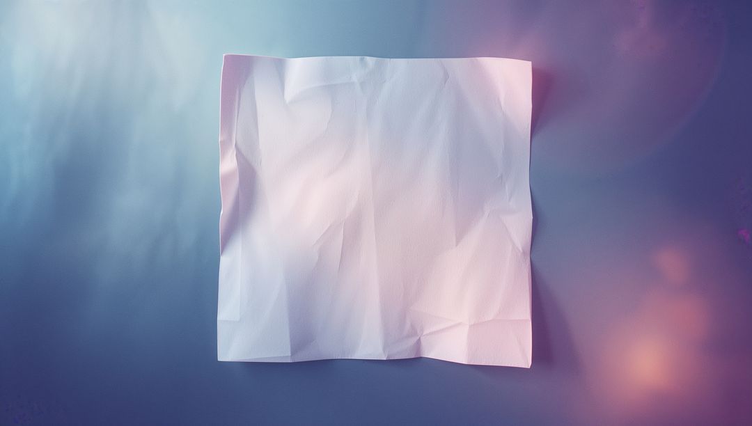 Crumpled White Paper on Gradient Background with Lens Flare