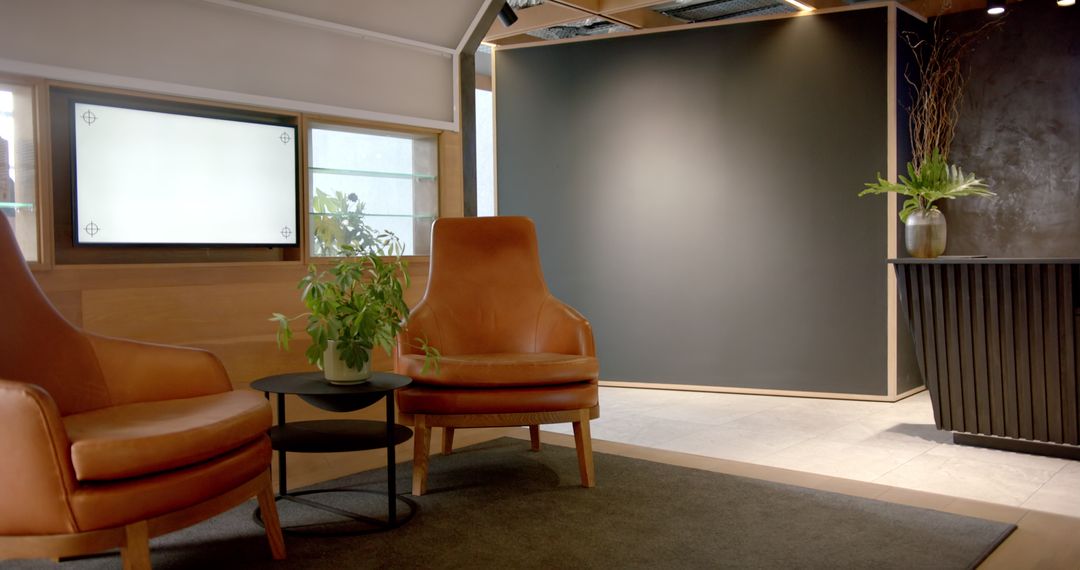 Modern Office Lobby with Leather Chairs and Copy Space