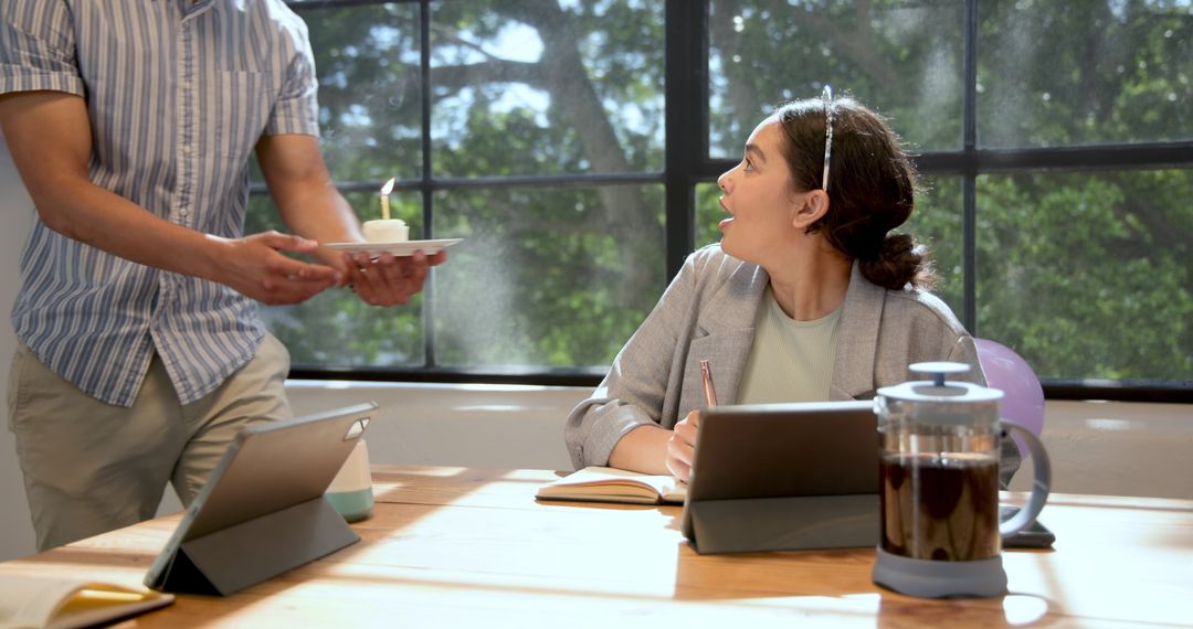 Surprised Businesswoman Receiving Birthday Cake in Office Celebration