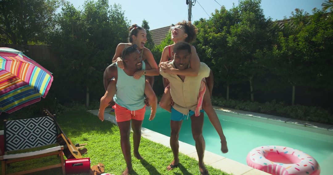 Friends Enjoying Summer in Backyard by Poolside