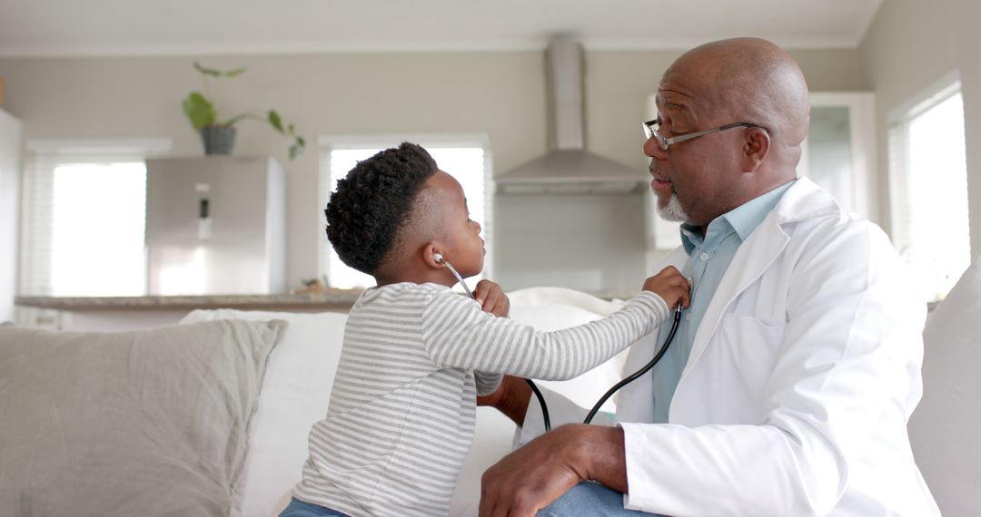 Child Playing Doctor with Grandfather at Home - Free Images, Stock Photos and Pictures on Pikwizard.com