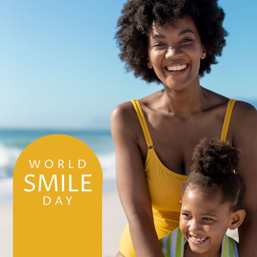 Mother and Daughter Enjoying World Smile Day at Beach