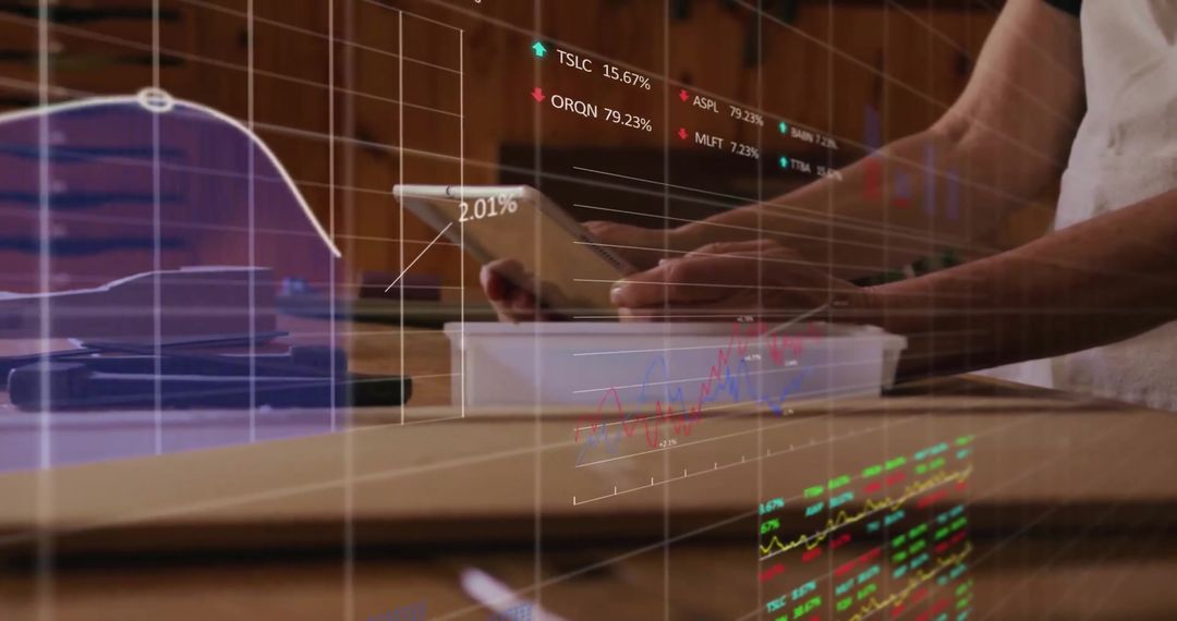 Businessman Analyzing Financial Data with Tablet in Office