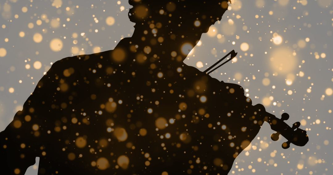 Silhouette of Violinist with Sparkling Light Effects