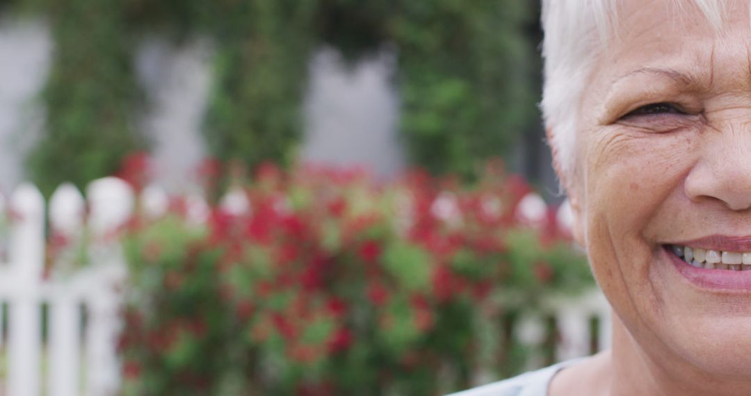 Senior Woman Smiling Suburban Garden Joy Retirement Lifestyle