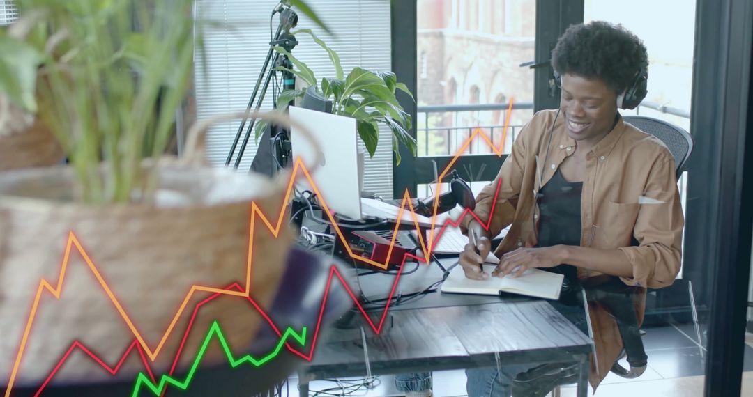 Entrepreneur Analyzing Data in Modern Office