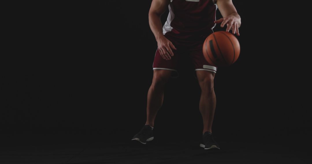 Athlete Dribbling Basketball in Game Uniform on Court - Free Images, Stock Photos and Pictures on Pikwizard.com