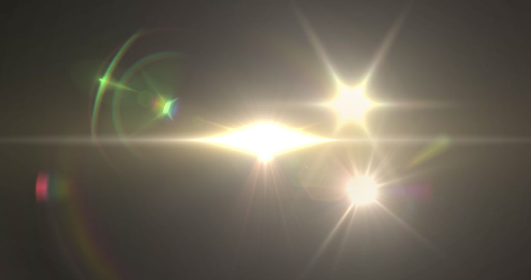 Abstract Light Flares on Dark Background Creating Lens Effects