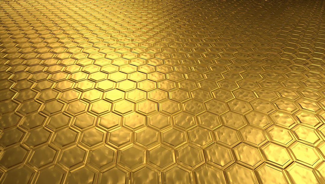 Glowing golden honeycomb metal surface tilting with embossed hex pattern and bevels