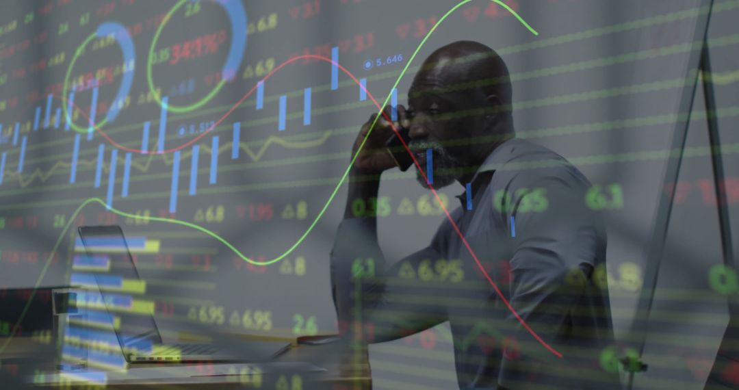 Businessman Analyzing Financial Data with Charts Overlayed