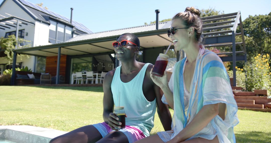 Relaxed Summer Vibes: Couple Enjoying Refreshments by Poolside