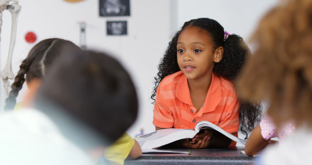 Curly-Haired Schoolgirl Presenting Book Report in Classroom