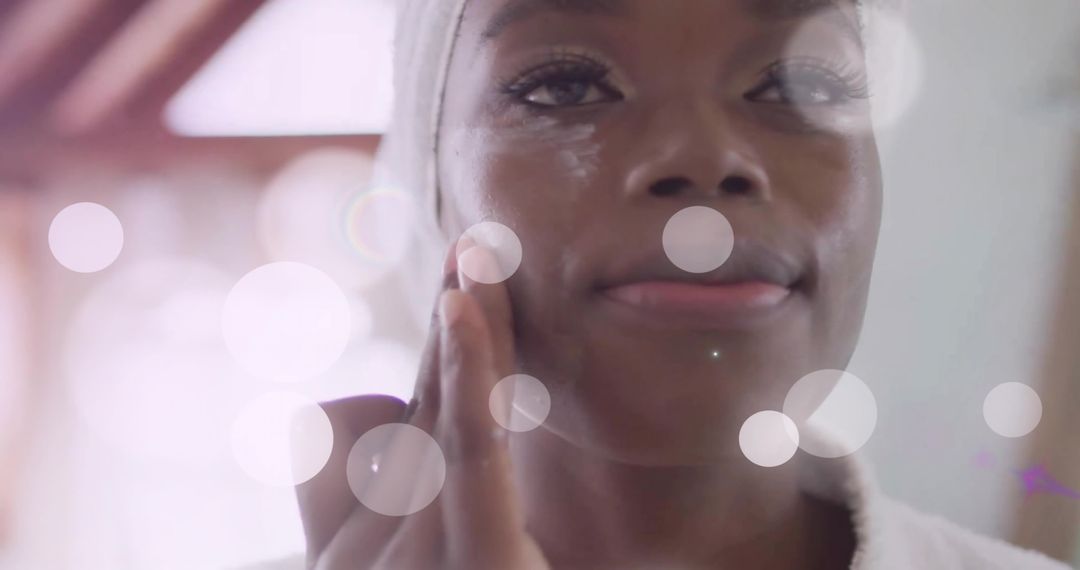 Woman Practicing Mindful Skincare in Soft Lighting