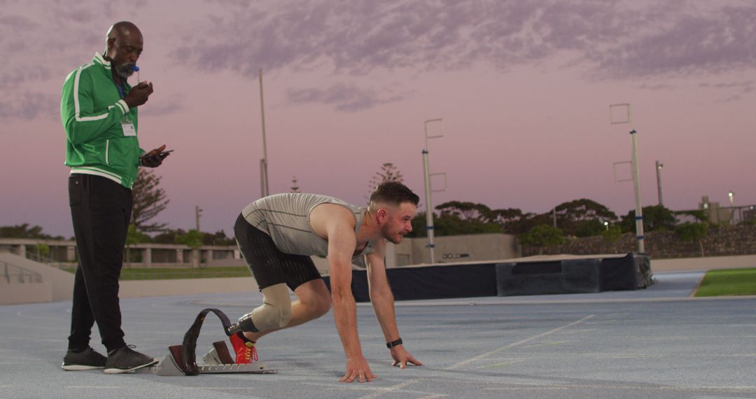 Diverse male coach and disabled athlete with running blade training at sunset - Free Images, Stock Photos and Pictures on Pikwizard.com