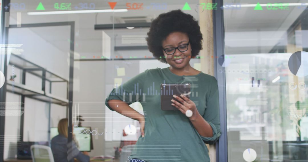 Confident Businesswoman Analyzing Financial Data on Tablet