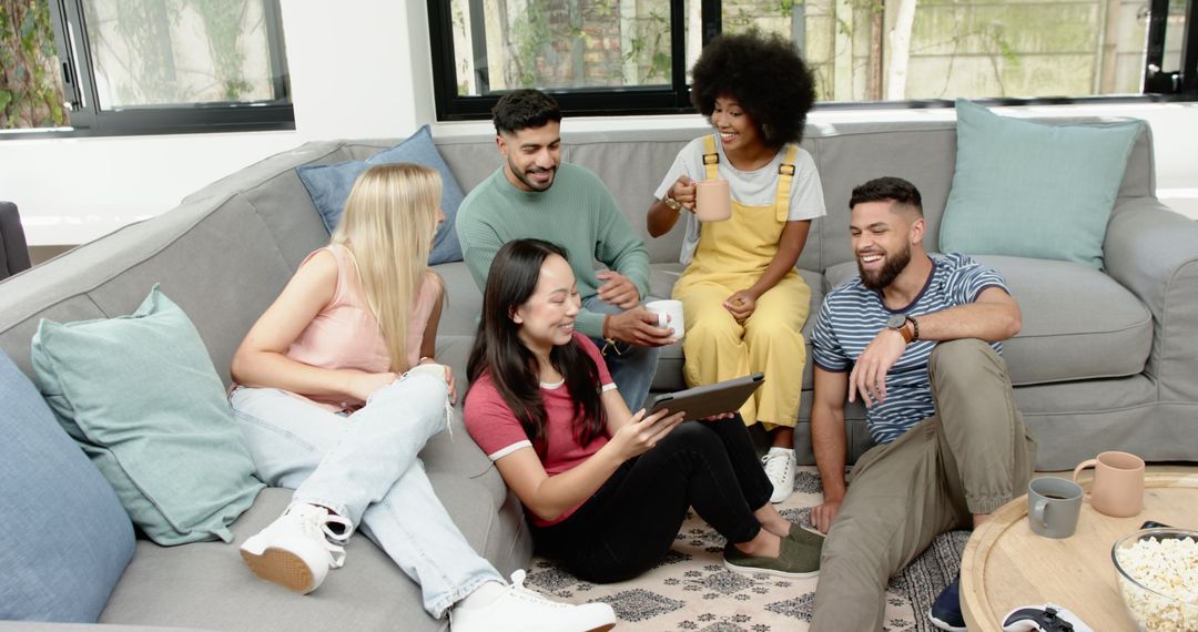 Diverse Group Enjoying Digital Entertainment at Home