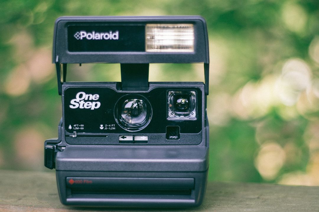 Polaroid camera photography  - Free Images, Stock Photos and Pictures on Pikwizard.com