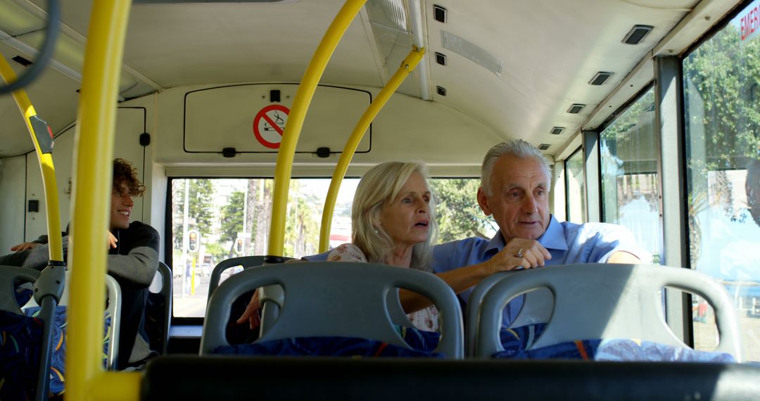 Senior Couple Enjoying Bus Ride During Daytime - Free Images, Stock Photos and Pictures on Pikwizard.com