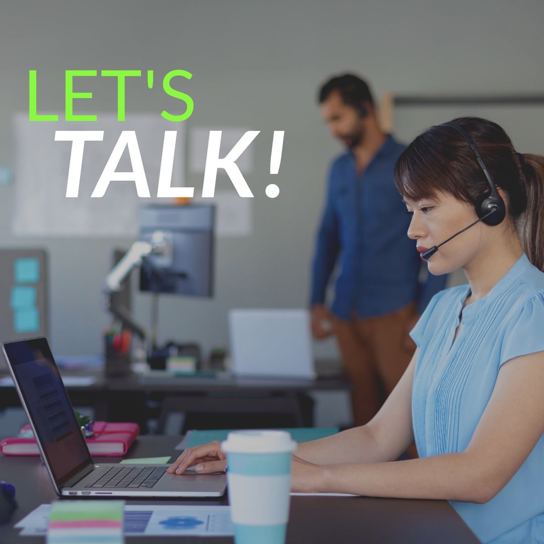 Businesswoman Using Headset Communicating in Modern Office