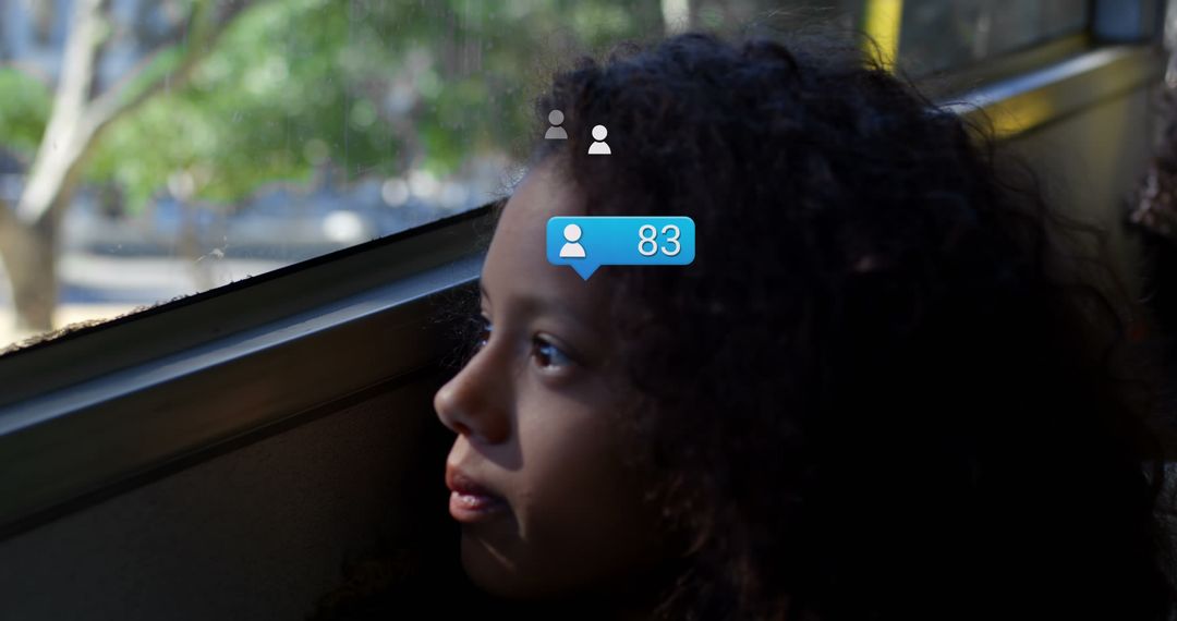 African American girl on bus contemplates her growing social media presence. - Free Images, Stock Photos and Pictures on Pikwizard.com