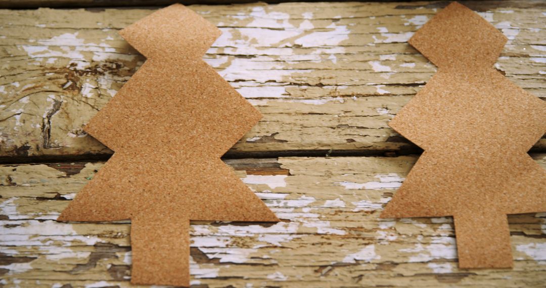 Rustic Christmas Tree Decorations on Weathered Wooden Background - Free Images, Stock Photos and Pictures on Pikwizard.com