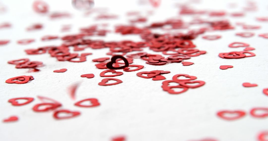 Valentine's Day Red Heart Confetti on White Background - Free Images, Stock Photos and Pictures on Pikwizard.com