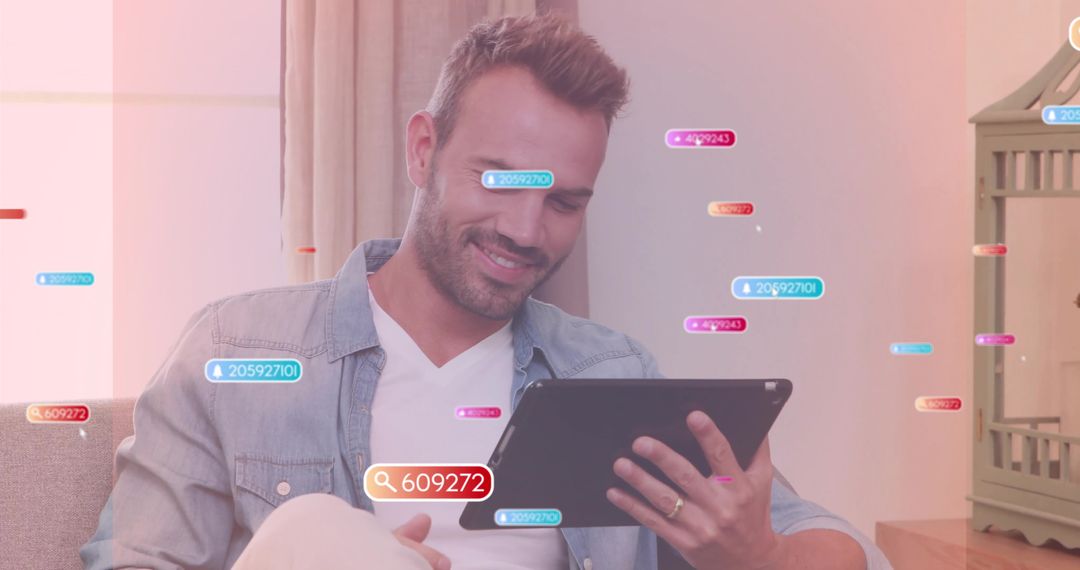 Man Viewing Floating Analytics on Tablet at Home