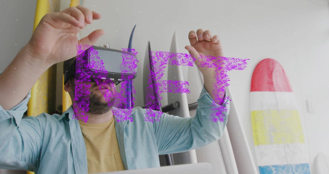 Man Using VR Headset in Surf Shop Surrounded by Surfboards