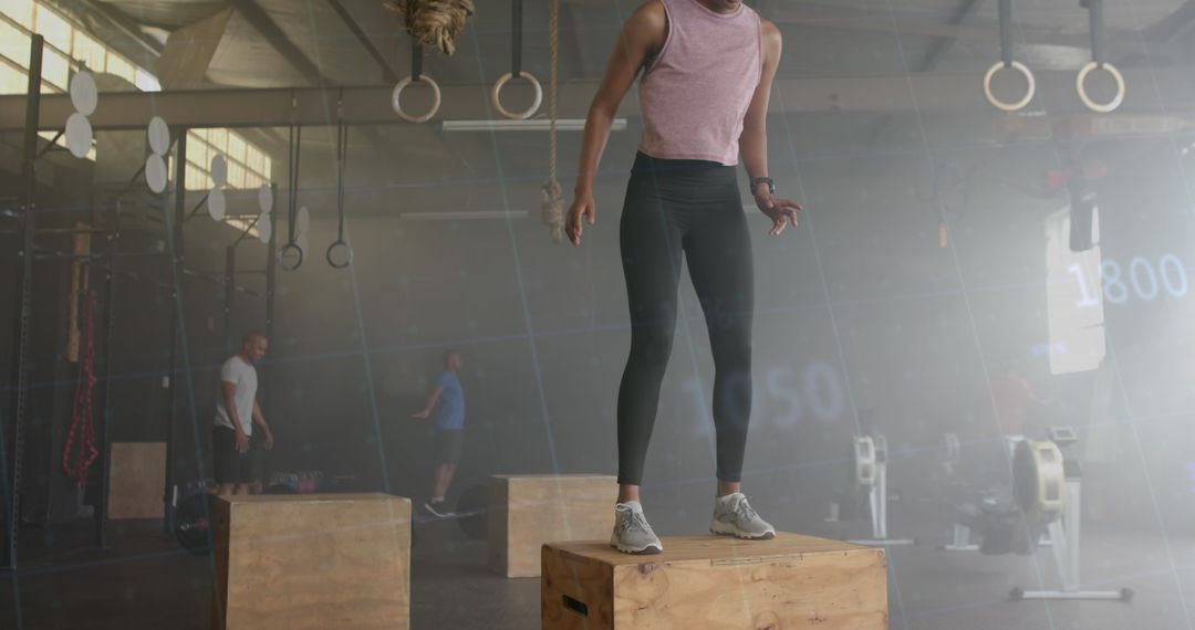 Biracial Woman Jumping on Box in Mashup of Cross Training and Digital Graphic