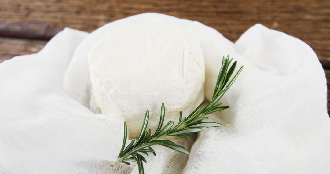 Fresh Homemade Ricotta Cheese with Rosemary on White Cloth - Free Images, Stock Photos and Pictures on Pikwizard.com