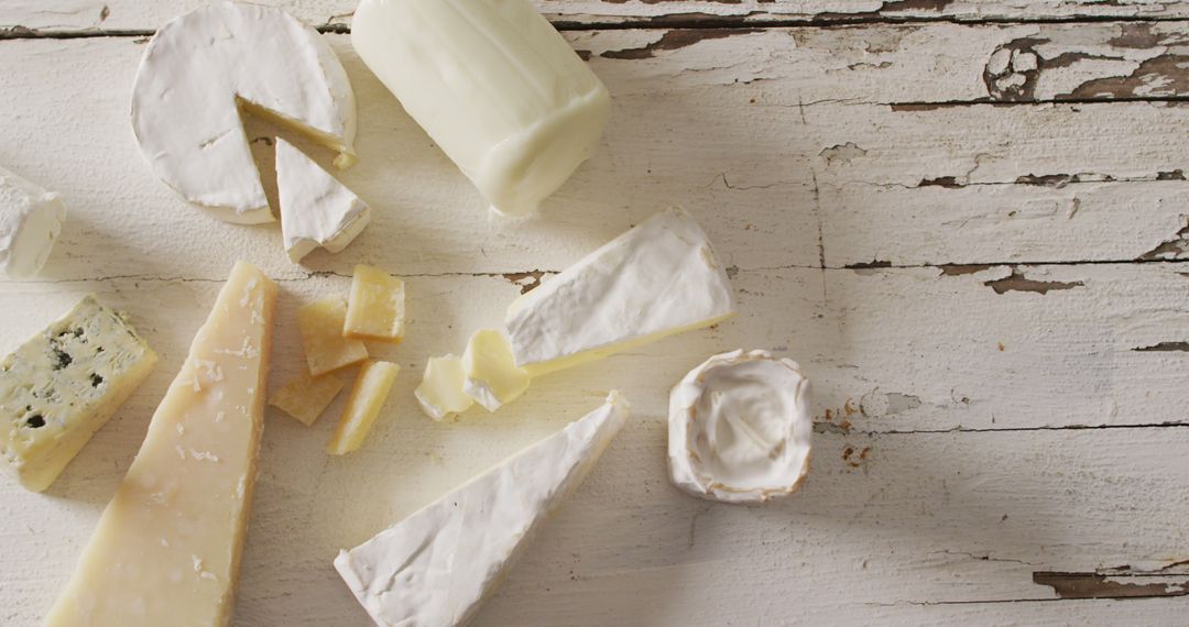 Various Types of Cheese on Rustic Wooden Table - Free Images, Stock Photos and Pictures on Pikwizard.com