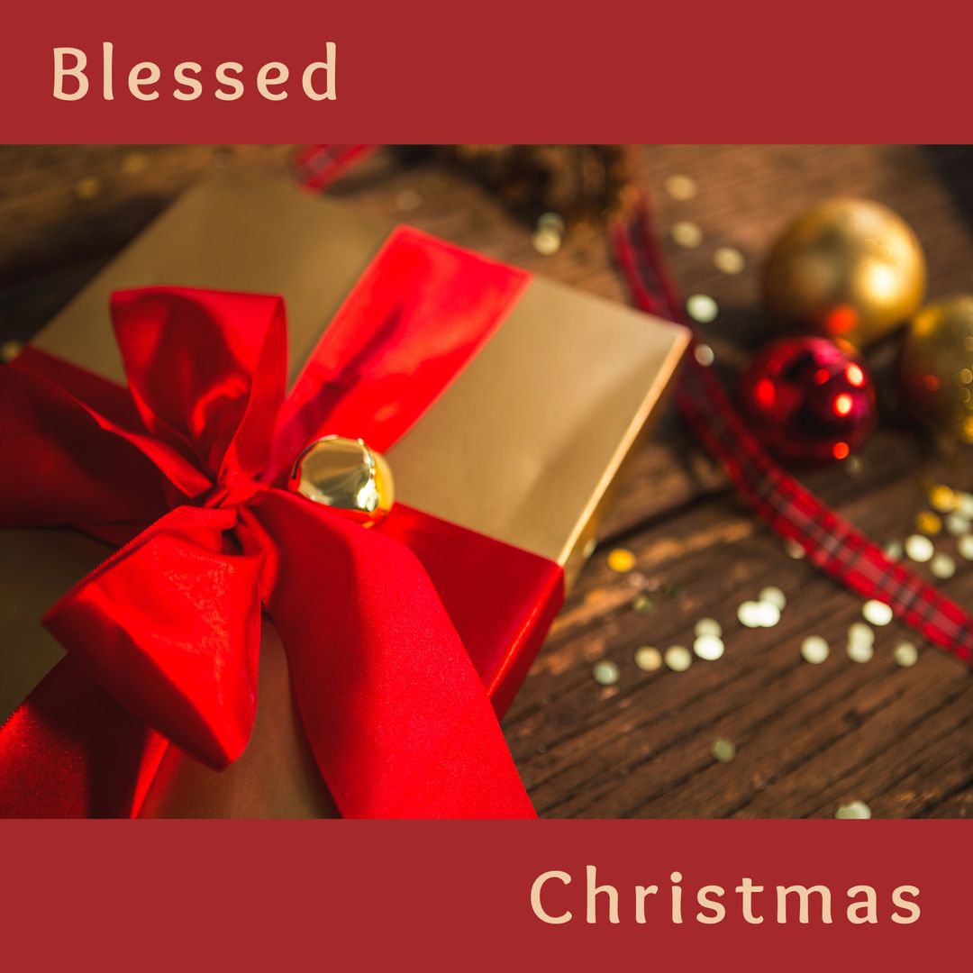 Golden Christmas Gift Box with Red Ribbon on Rustic Wood